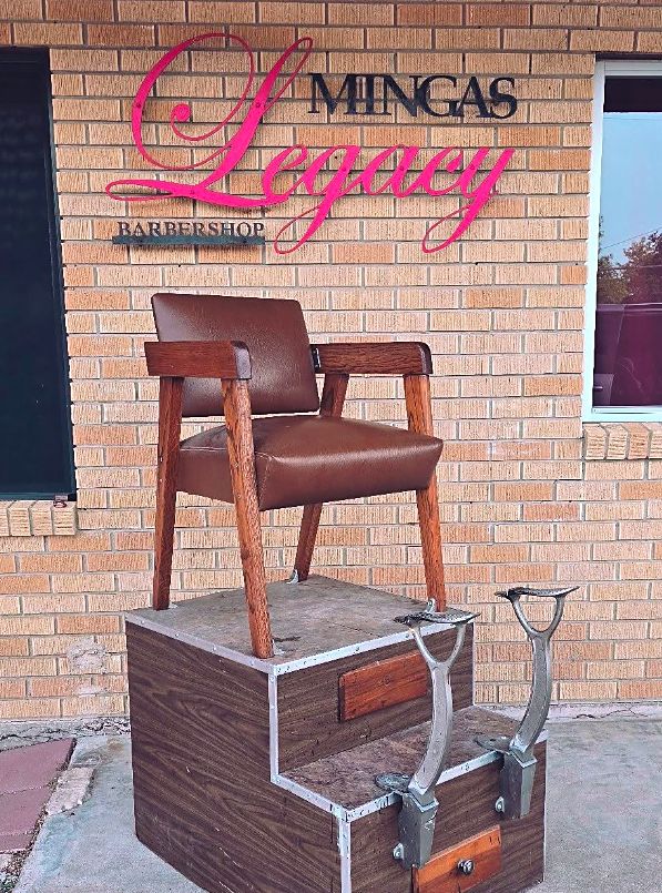 Vintage shoeshine chair outside the shop